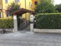CANTIERE CASTELMELLA 2 COSTRUZIONE NUOVO PORTICO CON ZOCCOLO IN PIETRA PERIMETRO CASA